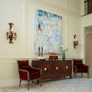 photo of entryway with antiques and contemporary art