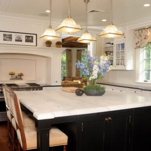 photo of kitchen design with white cabinets and counters