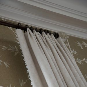detail photo of neutral fabric window treatment