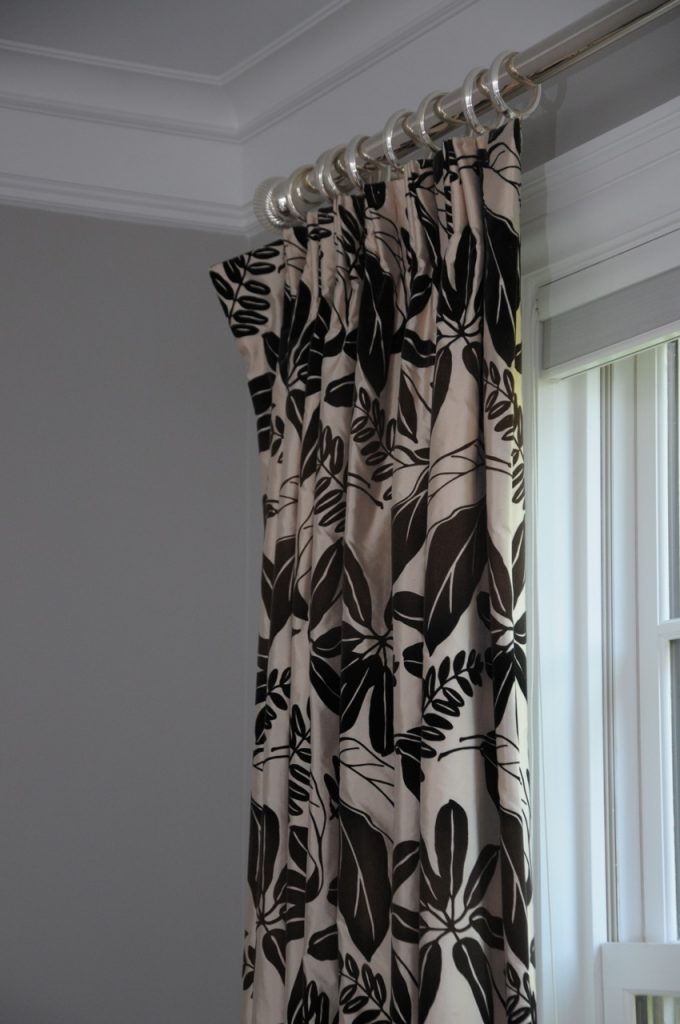 detail photo of natural print fabric window treatment