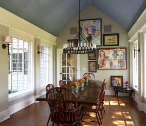 photo of kitchen table nook area with kids' artwork