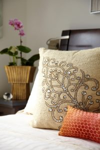 detail photo of custom designed pillows with beading