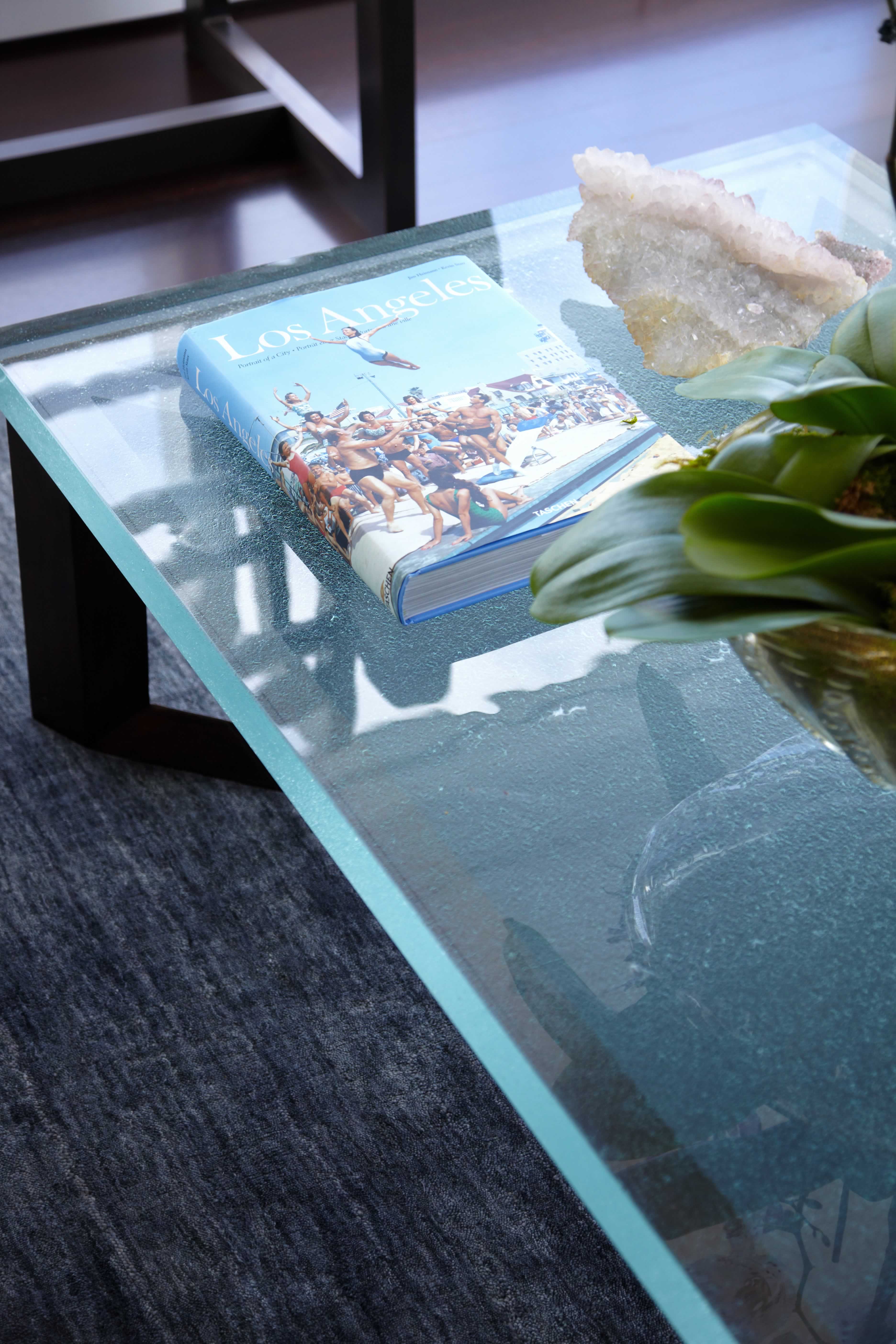 detail photo of contemporary glass top coffee table