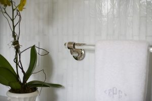 photo of bathroom design detail vertical white tile