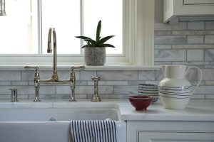 photo of white gray kitchen backsplash