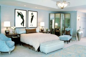 photo of master bedroom design with custom portraits of couple