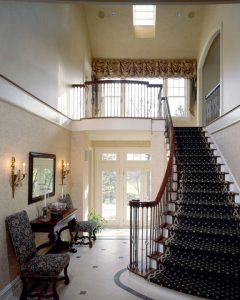 photo of traditional entryway with grand staircase