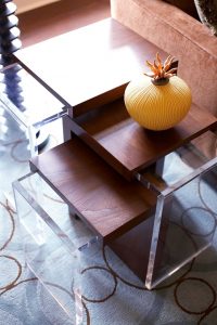 close up photo of contemporary end table made of glass and wood