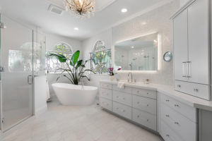 Luxurious bathroom with soaking tub and custom cabinetry
