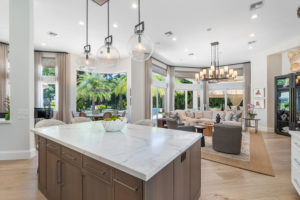 Kitchen island with view of the family room